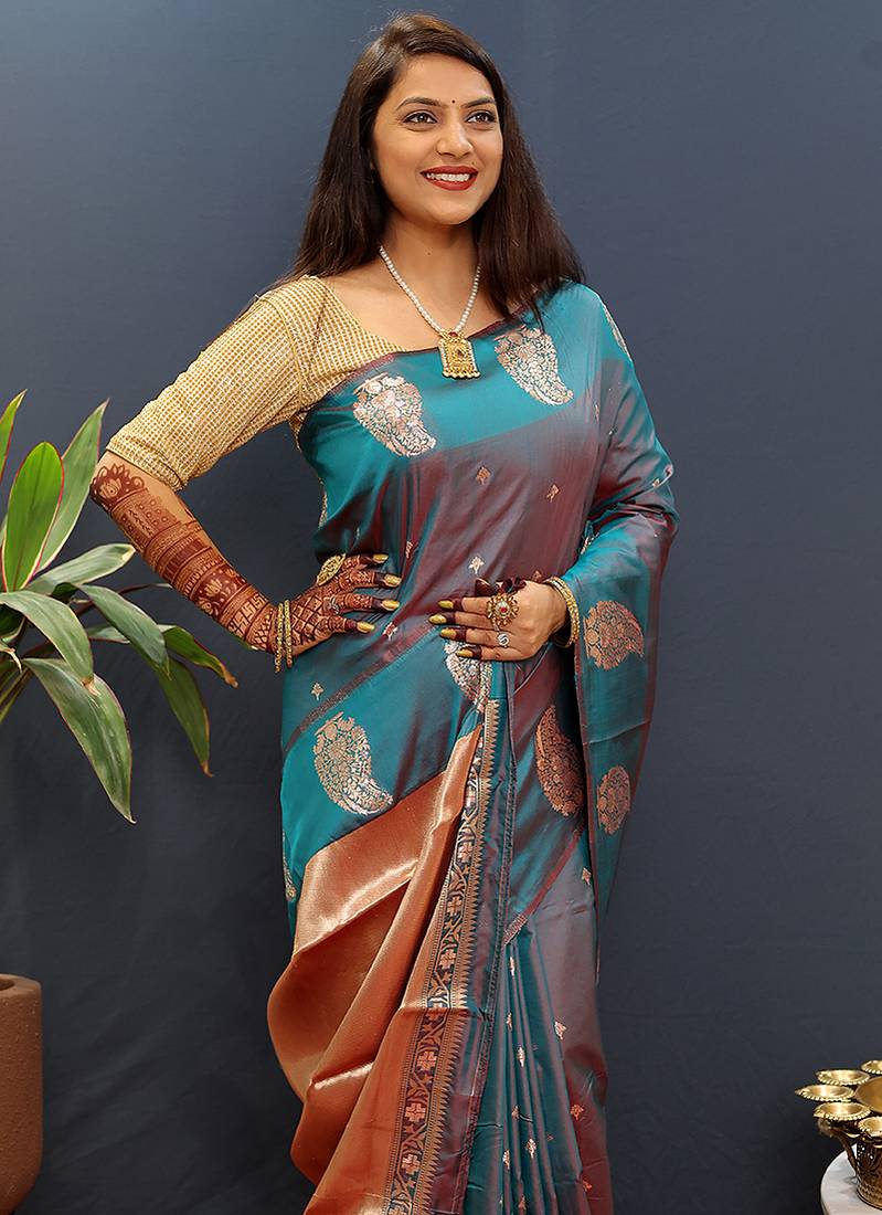 Teal blue silk blend banarasi saree with golden zari buti and border