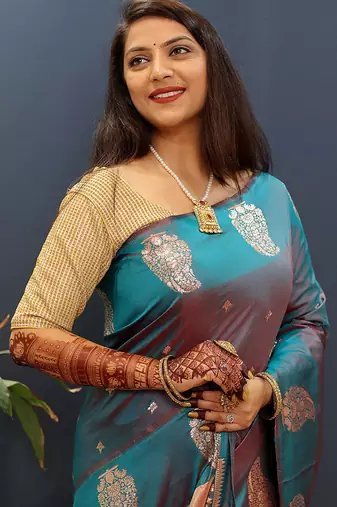 Teal blue silk blend banarasi saree with golden zari buti and border