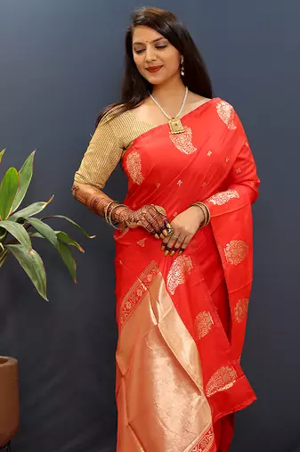 Red silk blend banarasi saree with golden zari buti and border