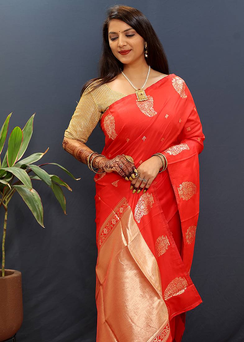 Red silk blend banarasi saree with golden zari buti and border
