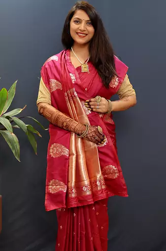 Rani pink silk blend banarasi saree with golden zari buti and border