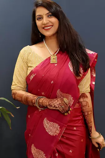 Rani pink silk blend banarasi saree with golden zari buti and border