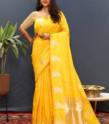 Mustard yellow silk blend banarasi saree with golden zari buti and border