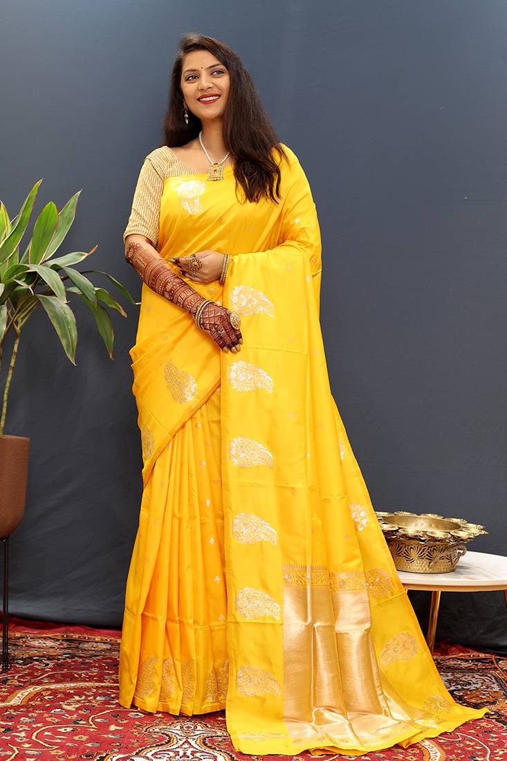Mustard yellow silk blend banarasi saree with golden zari buti and border