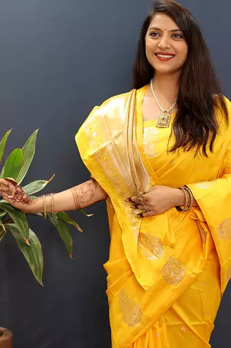 Mustard yellow silk blend banarasi saree with golden zari buti and border