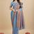 Sky blue silk blend banarasi saree with copper zari weaving, floral border