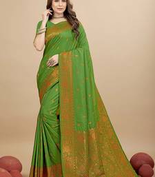 Green silk blend banarasi saree with copper zari weaving, floral border