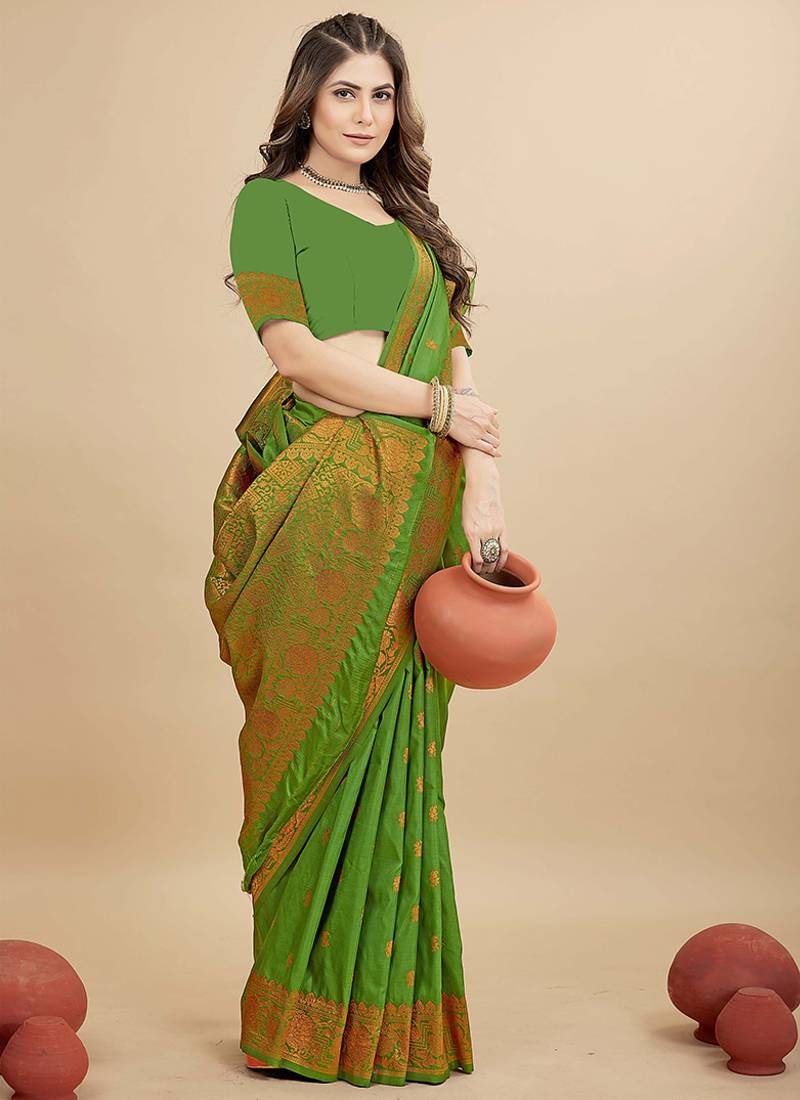 Green silk blend banarasi saree with copper zari weaving, floral border