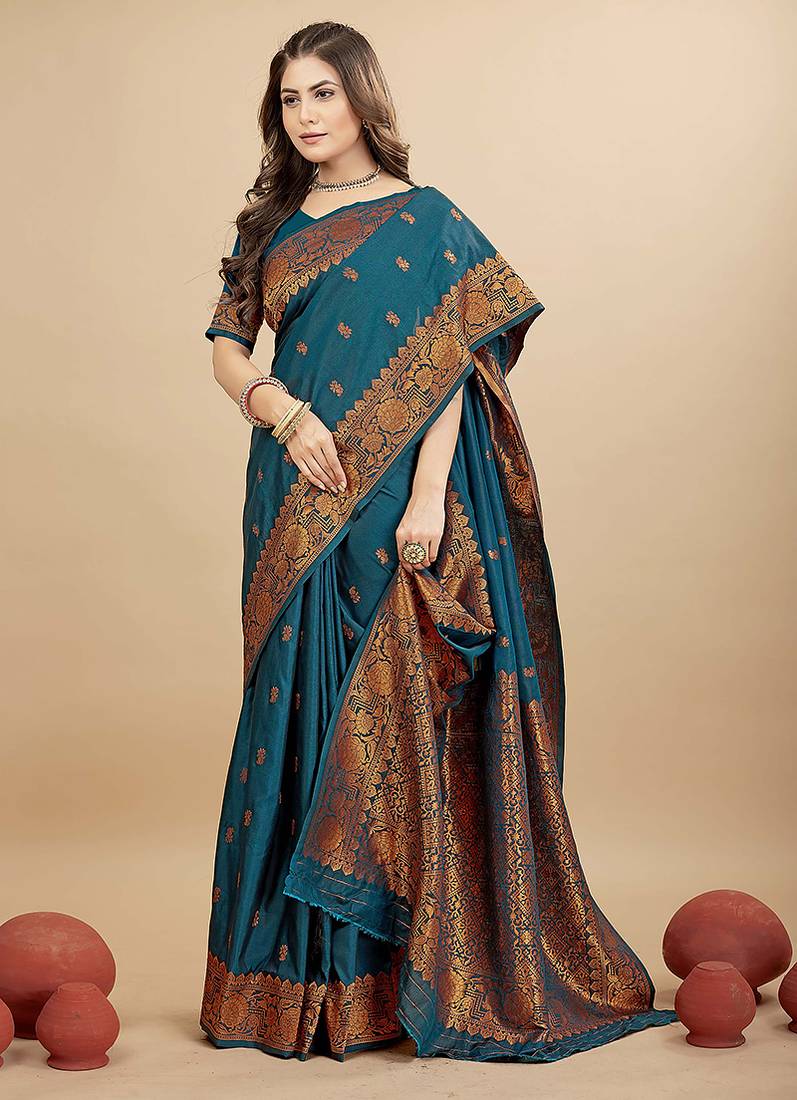Teal blue silk blend banarasi saree with copper zari weaving, floral border