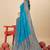 Sky blue silk blend banarasi saree with copper zari weaving, floral border