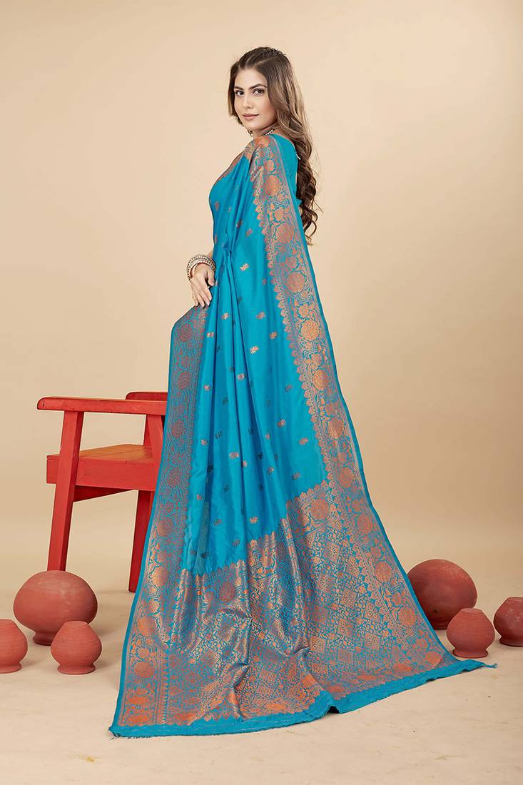 Sky blue silk blend banarasi saree with copper zari weaving, floral border