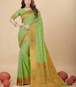 Light green silk blend banarasi saree with copper zari weaving, floral border