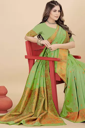 Light green silk blend banarasi saree with copper zari weaving, floral border