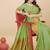 Light green silk blend banarasi saree with copper zari weaving, floral border