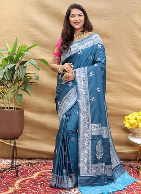 Teal blue silk blend banarasi saree with silver zari border and peacock pallu 1