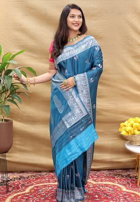 Teal blue silk blend banarasi saree with silver zari border and peacock pallu 2