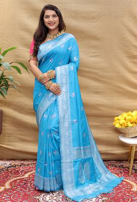 Sky blue silk blend banarasi saree with silver zari border and peacock pallu 1