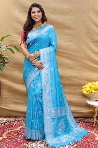 Sky blue silk blend banarasi saree with silver zari border and peacock pallu