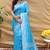 Sky blue silk blend banarasi saree with silver zari border and peacock pallu