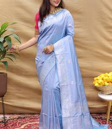 Lavender silk blend banarasi saree with silver zari border and peacock pallu