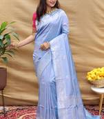 Lavender silk blend banarasi saree with silver zari border and peacock pallu