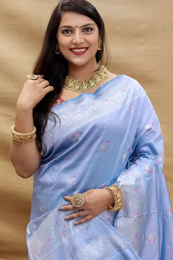 Lavender silk blend banarasi saree with silver zari border and peacock pallu