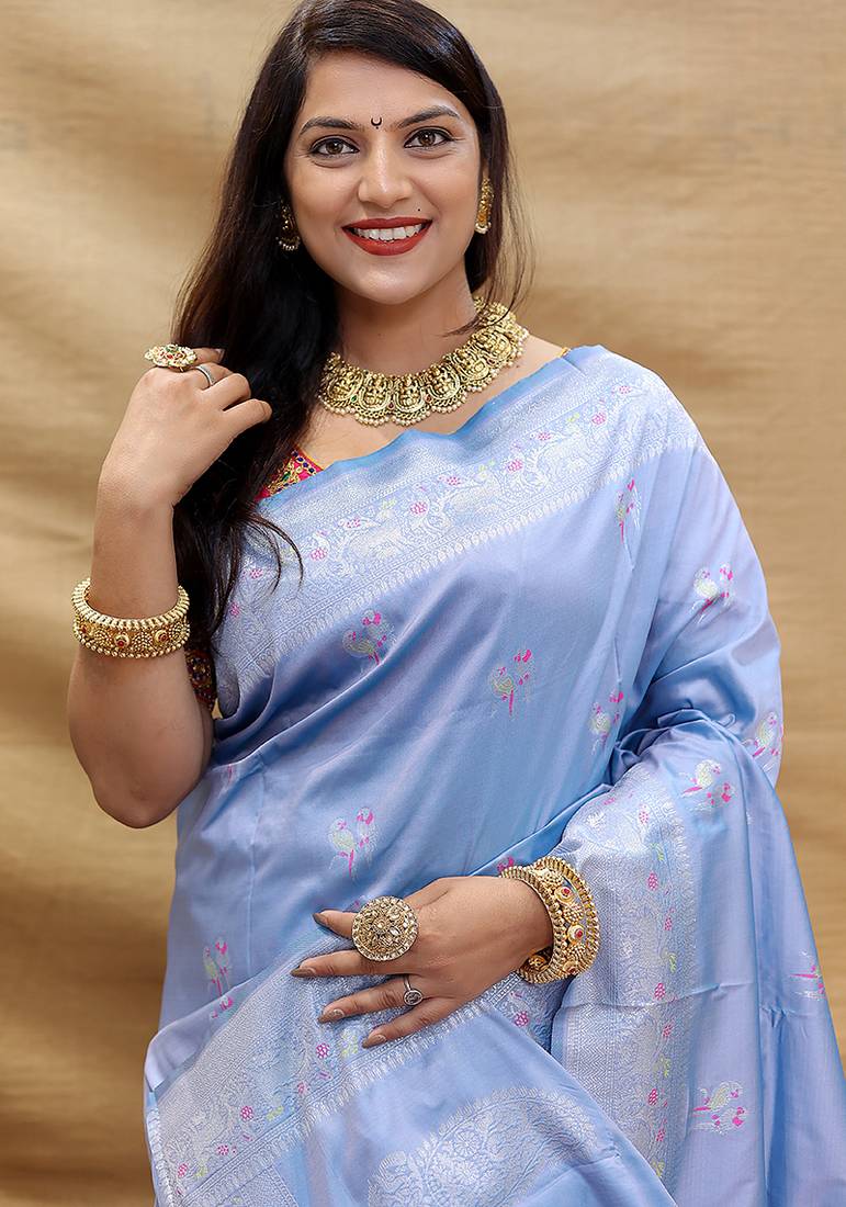 Lavender silk blend banarasi saree with silver zari border and peacock pallu