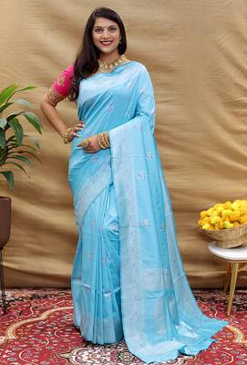 Sky blue silk blend banarasi saree with silver zari border and peacock pallu 1