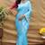 Sky blue silk blend banarasi saree with silver zari border and peacock pallu