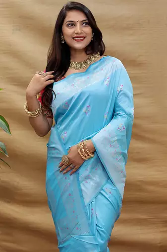 Sky blue silk blend banarasi saree with silver zari border and peacock pallu