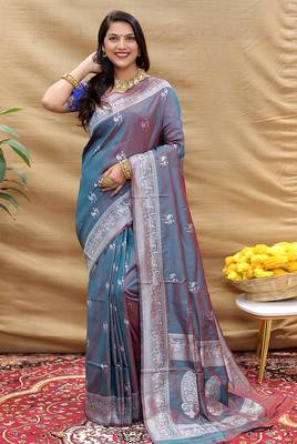 Grey silk blend banarasi saree with silver zari border and peacock pallu 1