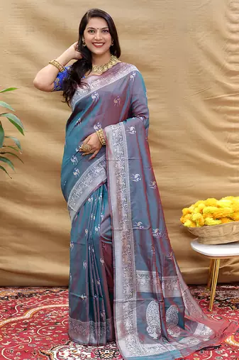 Grey silk blend banarasi saree with silver zari border and peacock pallu