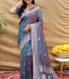 Grey silk blend banarasi saree with silver zari border and peacock pallu