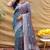 Grey silk blend banarasi saree with silver zari border and peacock pallu