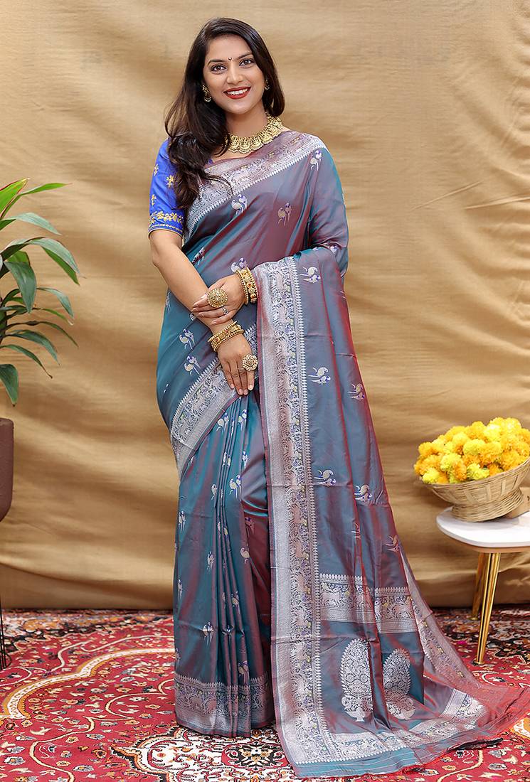 Grey silk blend banarasi saree with silver zari border and peacock pallu
