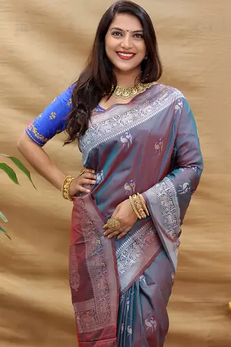 Grey silk blend banarasi saree with silver zari border and peacock pallu