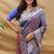 Grey silk blend banarasi saree with silver zari border and peacock pallu
