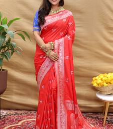 Red silk blend banarasi saree with silver zari border and peacock pallu