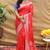 Red silk blend banarasi saree with silver zari border and peacock pallu