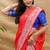 Red silk blend banarasi saree with silver zari border and peacock pallu