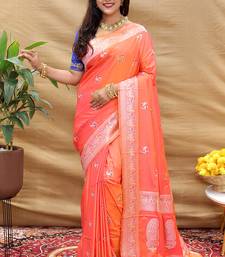 Peach pink silk blend banarasi saree with silver zari border and peacock pallu