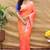 Peach pink silk blend banarasi saree with silver zari border and peacock pallu
