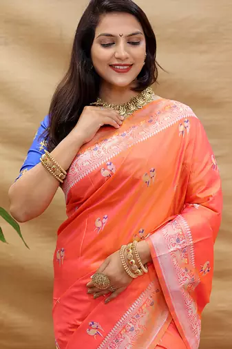 Peach pink silk blend banarasi saree with silver zari border and peacock pallu