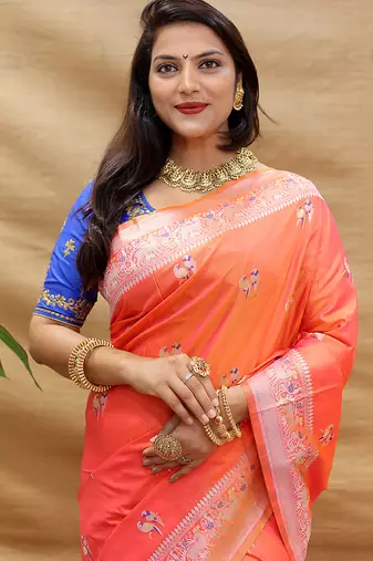 Peach pink silk blend banarasi saree with silver zari border and peacock pallu