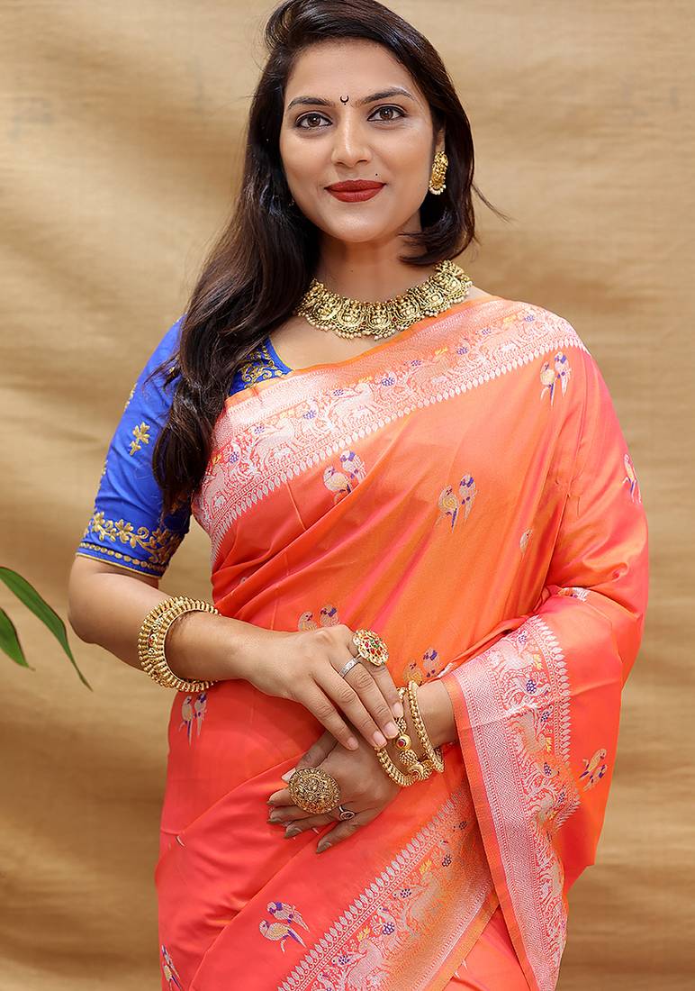 Peach pink silk blend banarasi saree with silver zari border and peacock pallu