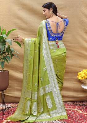 Light olive silk blend banarasi saree with silver zari border and peacock pallu 2