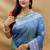 Blue silk blend banarasi saree with silver zari border and peacock pallu
