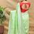 Mint green silk blend banarasi saree with silver zari border and peacock pallu