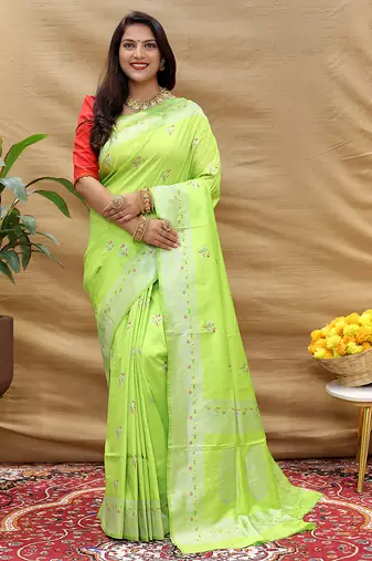 Lime green silk blend banarasi saree with silver zari border and peacock pallu