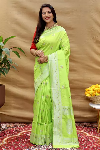 Lime green silk blend banarasi saree with silver zari border and peacock pallu